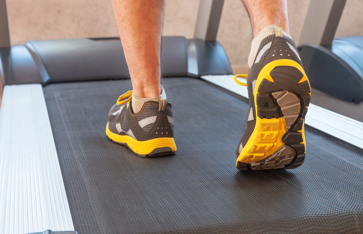 feet on a treadmill