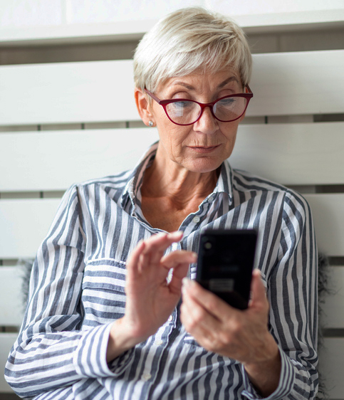 woman using app on her phone