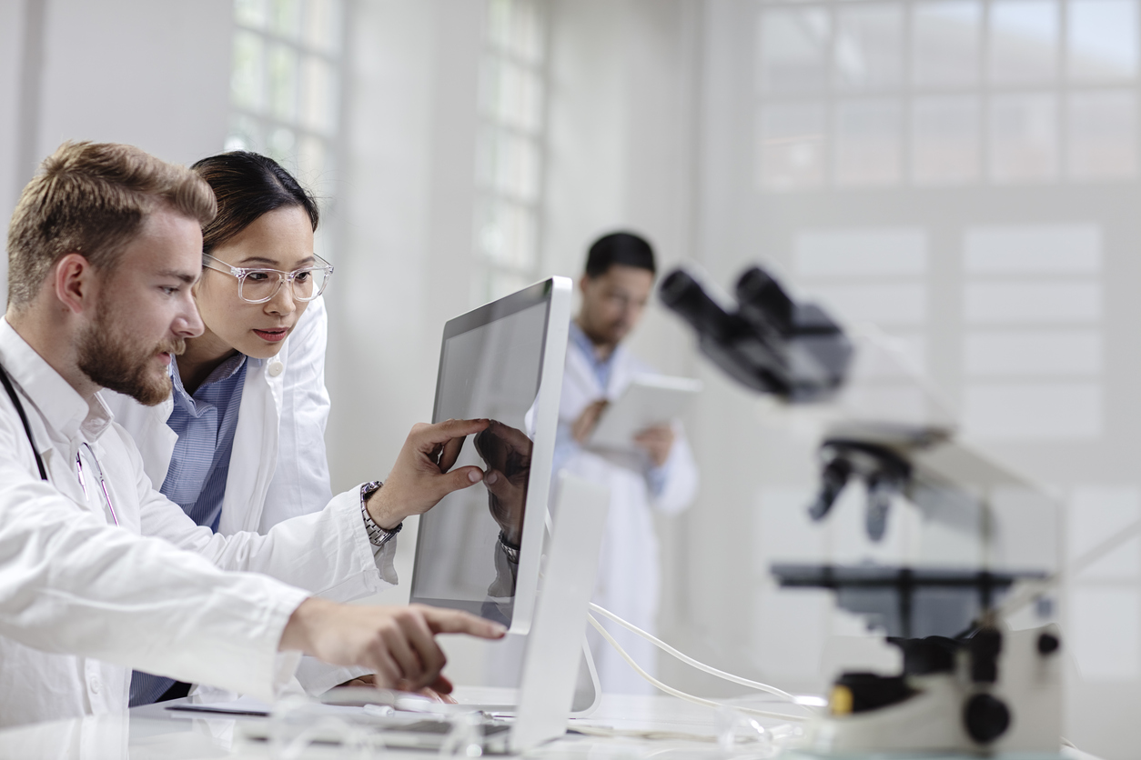 pharmacists looking at a computer screen