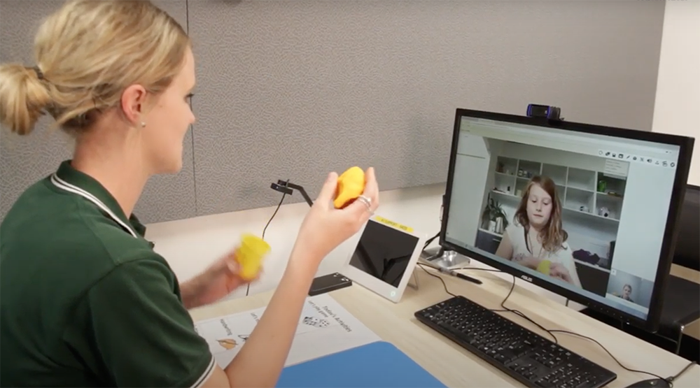 child doing telerehabilitation