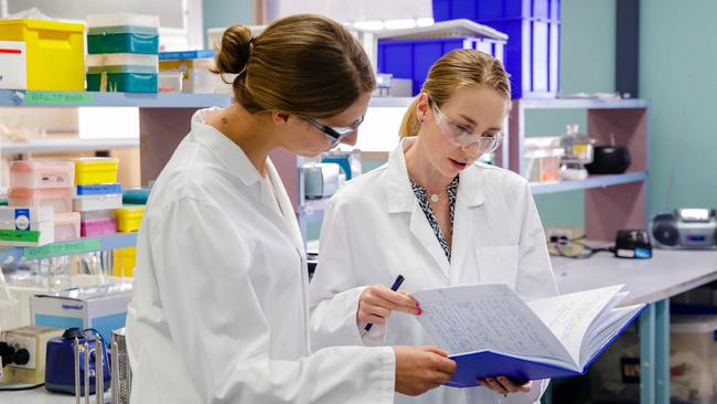 researchers in lab