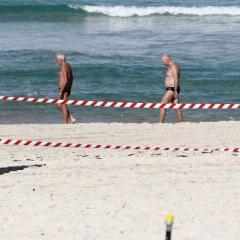 men on a beach