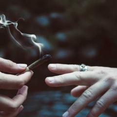 hands passing a joint
