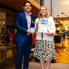 Dr Amirali Popat receiving his award
