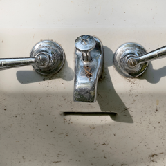 Bathroom sink with taps that looks like an illusion of a face