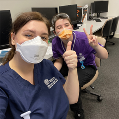 Katie Vidler and another student in a computer lab