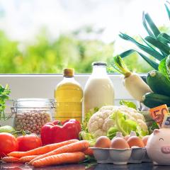 an array of fruits, vegetables and legumes on a kitchen counter