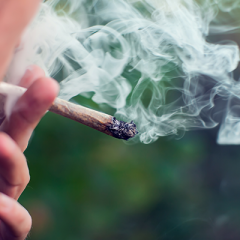 person smoking cigarette