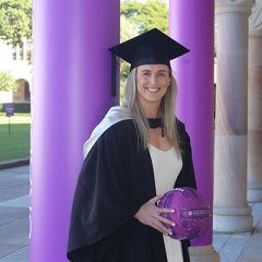 Gabi Simpson in regalia in the UQ Great Court