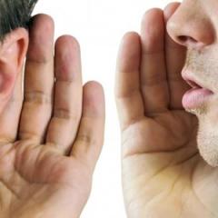 people confiding secrets
