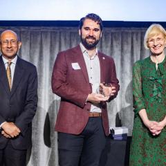 Dr Jared Miles receiving a teaching and learning week award
