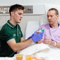 Occupational therapy student and patient 