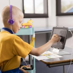 child doing speech pathology via telepractice