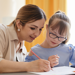 Mother and Daughter writing 