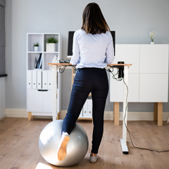 Woman working from home at a stand up desk