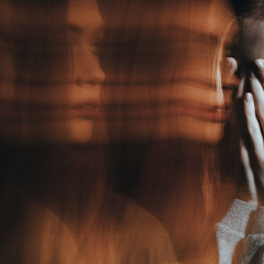 woman with hands on face