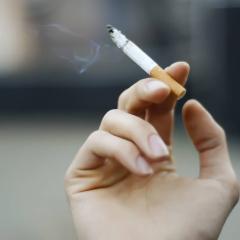 hand holding cigarette