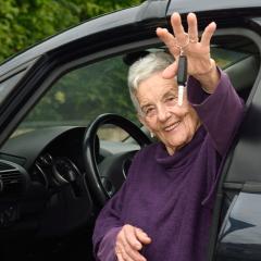 older woman in car