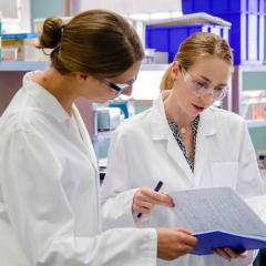 researchers in lab