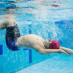 Paralympic swimmer turning underwater 
