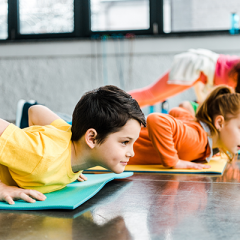 Children stretching on yoga mats