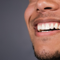 Close up of man's teeth as he smiles