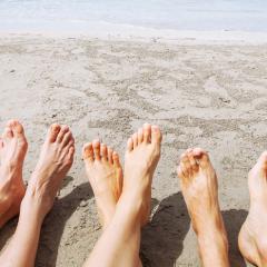 feet on a beach