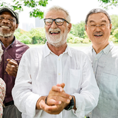 a group of elderly people smiling and laughing