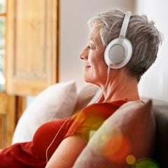 older woman listening to music